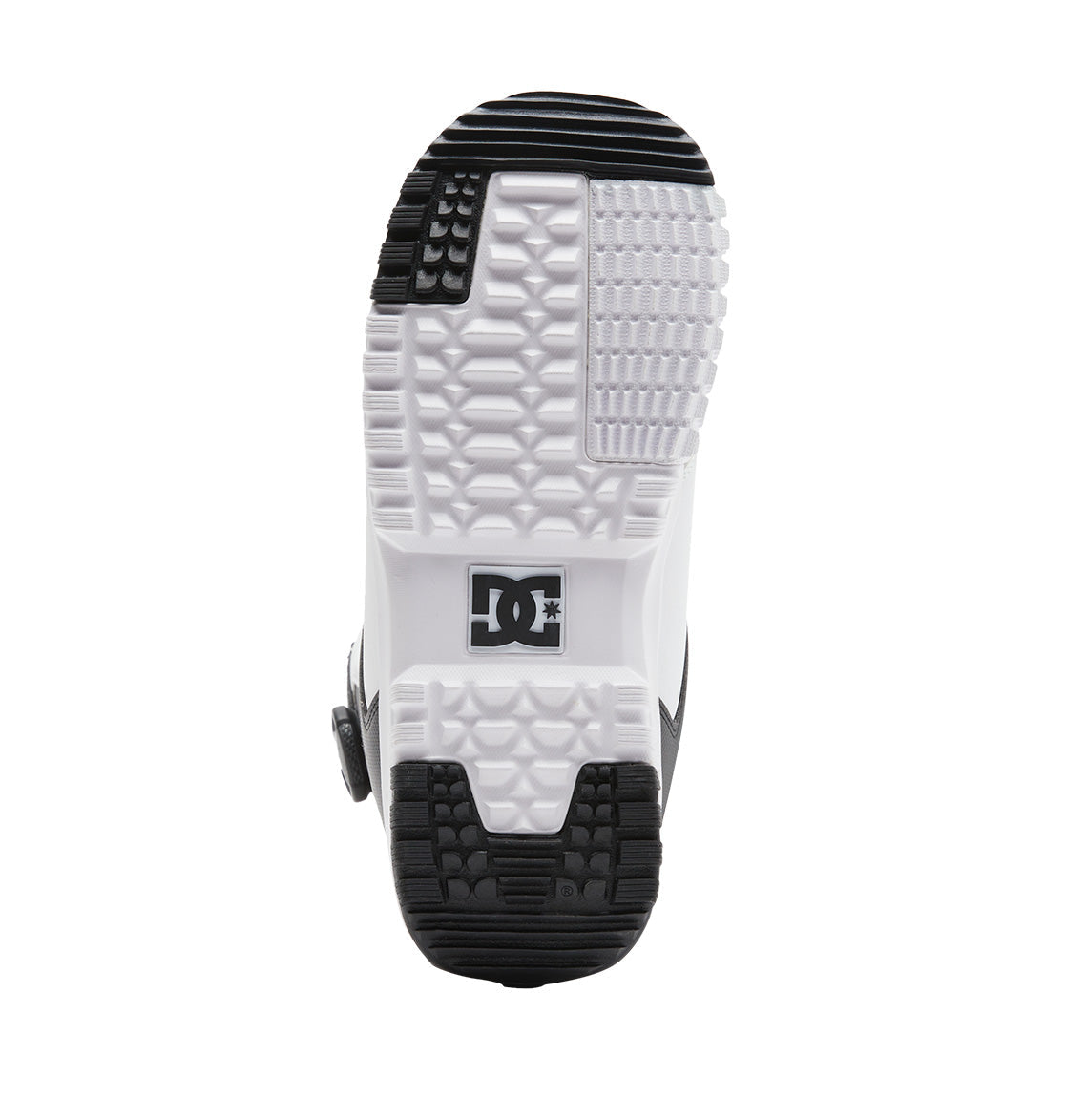 Bottom view of the DC Shoes Men’s Control BOA® Snowboard Boot sole, featuring a white textured rubber tread with black grip pads at the toe and heel, and a DC logo emblem in the midsole area—a design inspired by the brand’s legendary skate footwear.