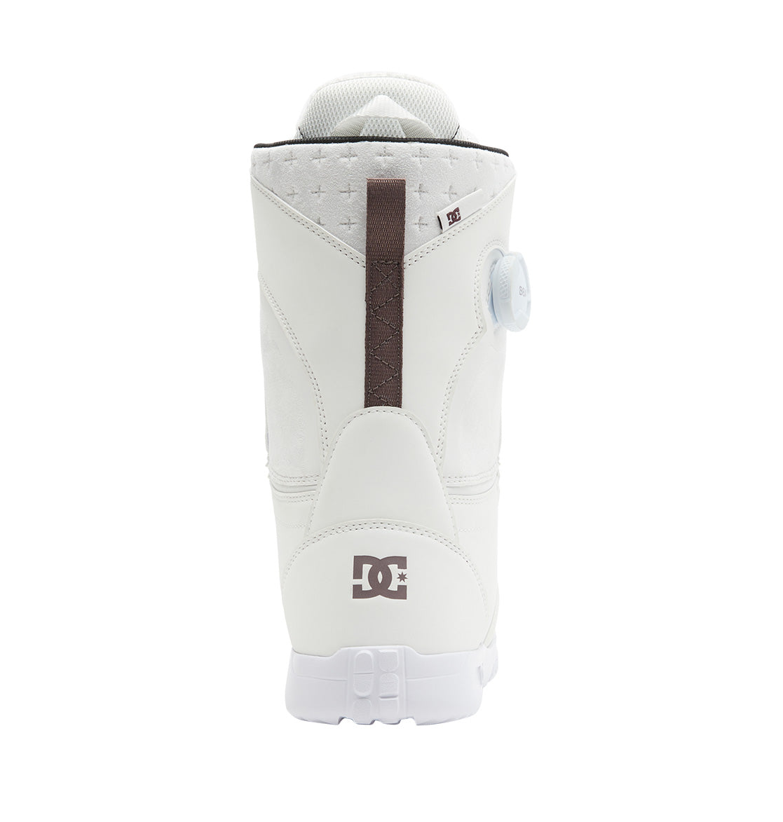 A women’s Lotus BOA® snowboard boot by DC Shoes in white, viewed from the back, displays the DC logo near the heel and features a round BOA® tightening dial on the side. The boot is equipped with a comfortable R2 liner, a pull tab at the top, and textured stitching details.
