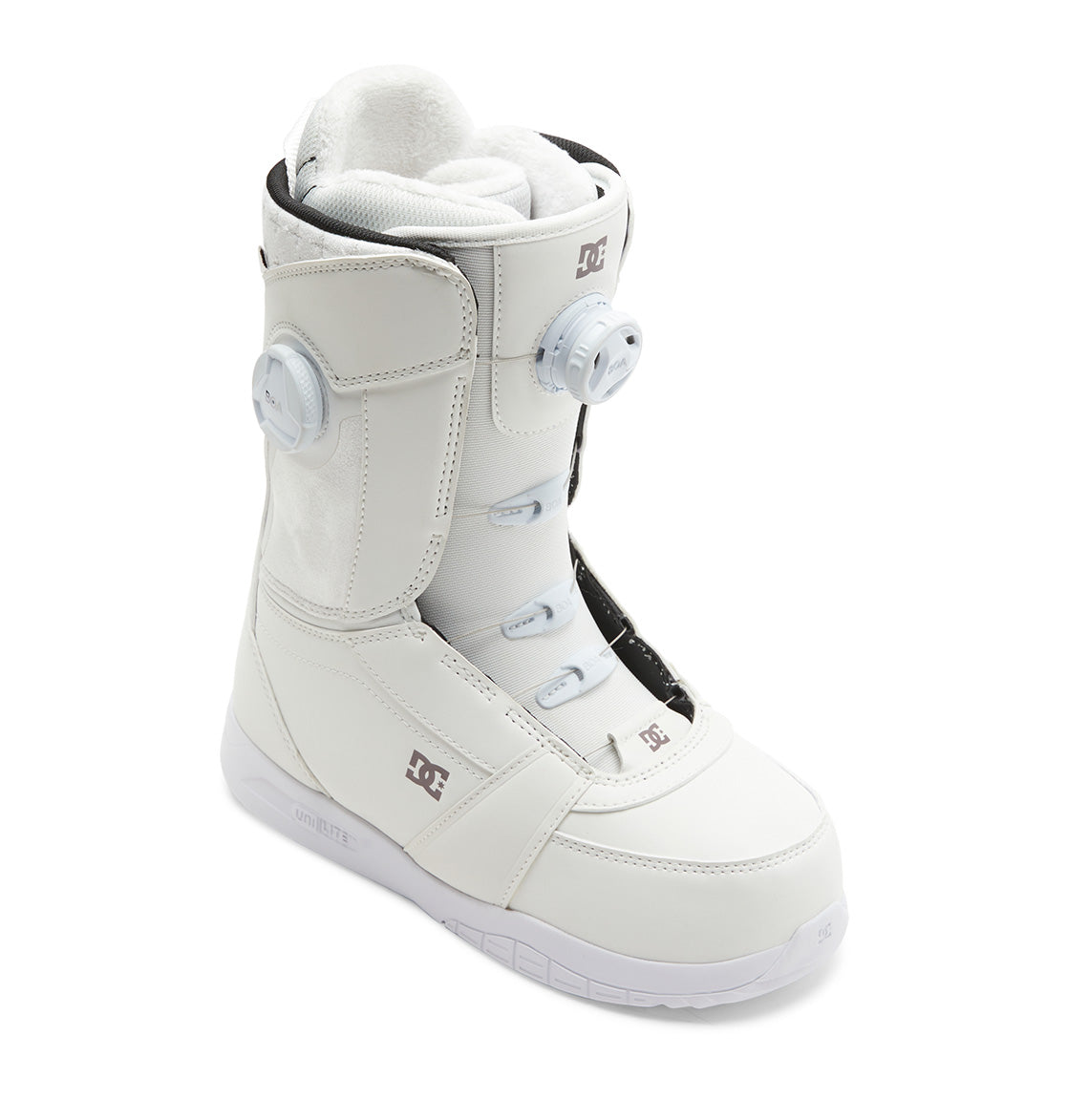 Introducing the DC Shoes Women’s Lotus BOA® Snowboard Boots: a white boot with Dual Zone BOA Fit System lacing, padded interior, DC Shoes logo, and a Unilite outsole for lightweight cushioning—all presented on a white background.