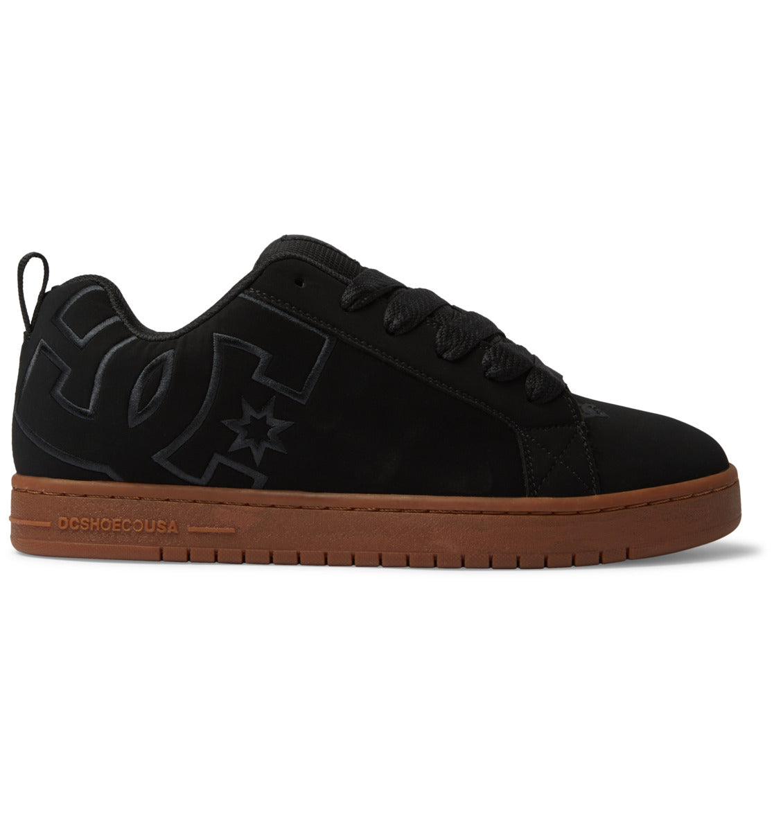 The Men’s Court Graffik Shoes by DC Shoes feature a black skate shoe design with a prominent DC logo on the side, black laces, and a brown rubber sole. Showcasing the classic puffy silhouette from the Court Graffik collection, these low-top shoes include a convenient heel pull tab.