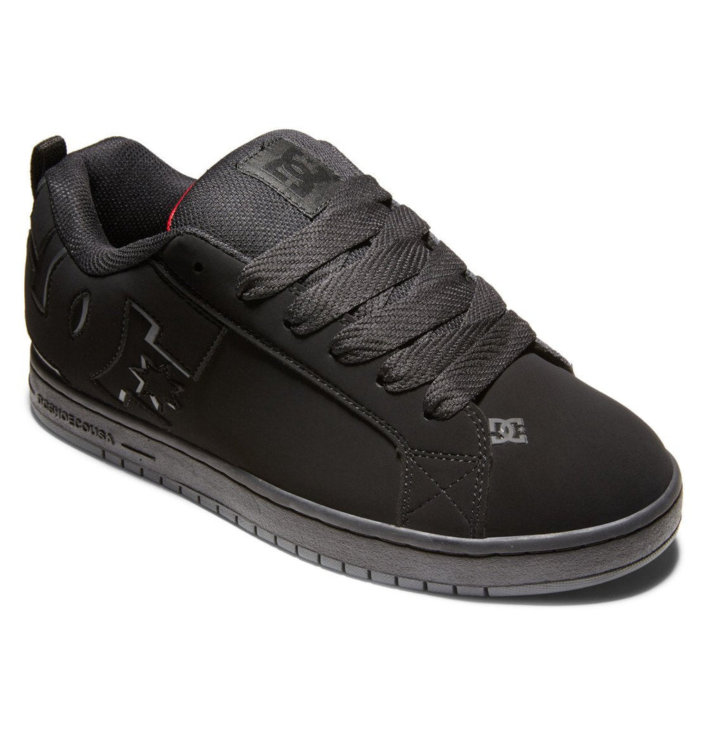 The Men’s Court Graffik Shoes by DC Shoes are black skate shoes with a puffy silhouette, thick laces, a textured sole, and the signature DC logo on both the side and tongue. Inspired by the classic Court Graffik design, these low-top shoes feature simple stitching details for a timeless skate style.
