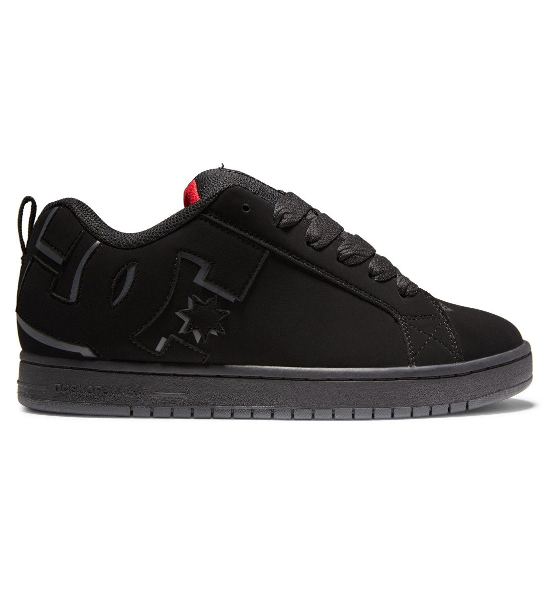 The DC Shoes Men’s Court Graffik Shoes feature a black low-top silhouette with a thick sole, lace-up closure, and subtle DC logo detailing on the side. Designed with a small red accent on the tongue, these sneakers offer a sleek, minimalist appearance along with a slightly puffy build for enhanced comfort and street-inspired style.