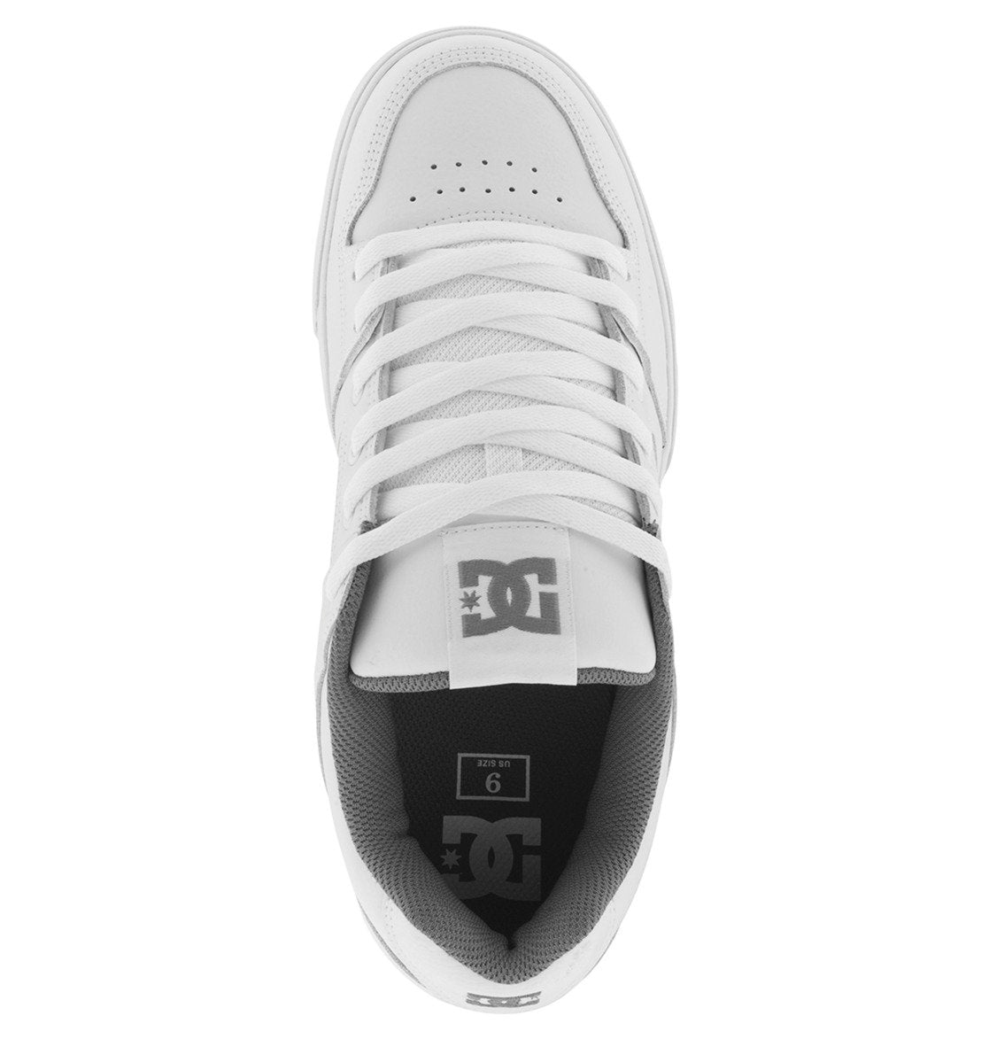 Top view of a white Men’s Pure Shoe by DC Shoes featuring white laces, gray interior lining, and a prominent black DC logo on the tongue. Recognized as one of DC Shoes’ best-selling men’s models, this pair offers exceptional style and support for everyday wear. The insole displays a US size 9 label, emphasizing its popularity among those who value comfort for any occasion.