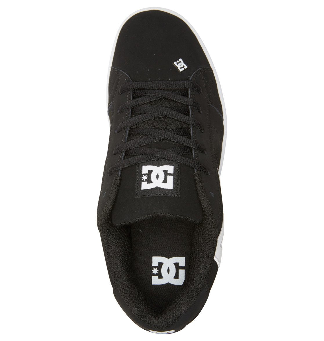 A top-down view of the Men’s Net Shoes by DC Shoes shows a black puffy sneaker crafted from durable materials, with bold white DC Shoes logos on the tongue and toe, black laces, and a contrasting white sole.