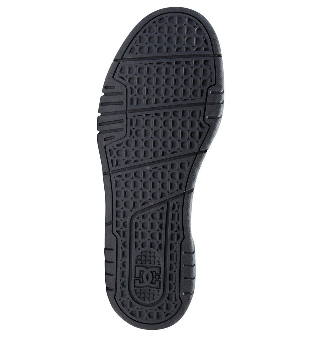 Crafted for performance, the DC Shoes Men’s Stag Shoes feature a black sneaker sole with a textured pattern highlighted by circular and hexagonal grips for superior traction. The technical design incorporates a durable cupsole with flexible grooves, and the signature DC Shoes logo is embossed near the heel.