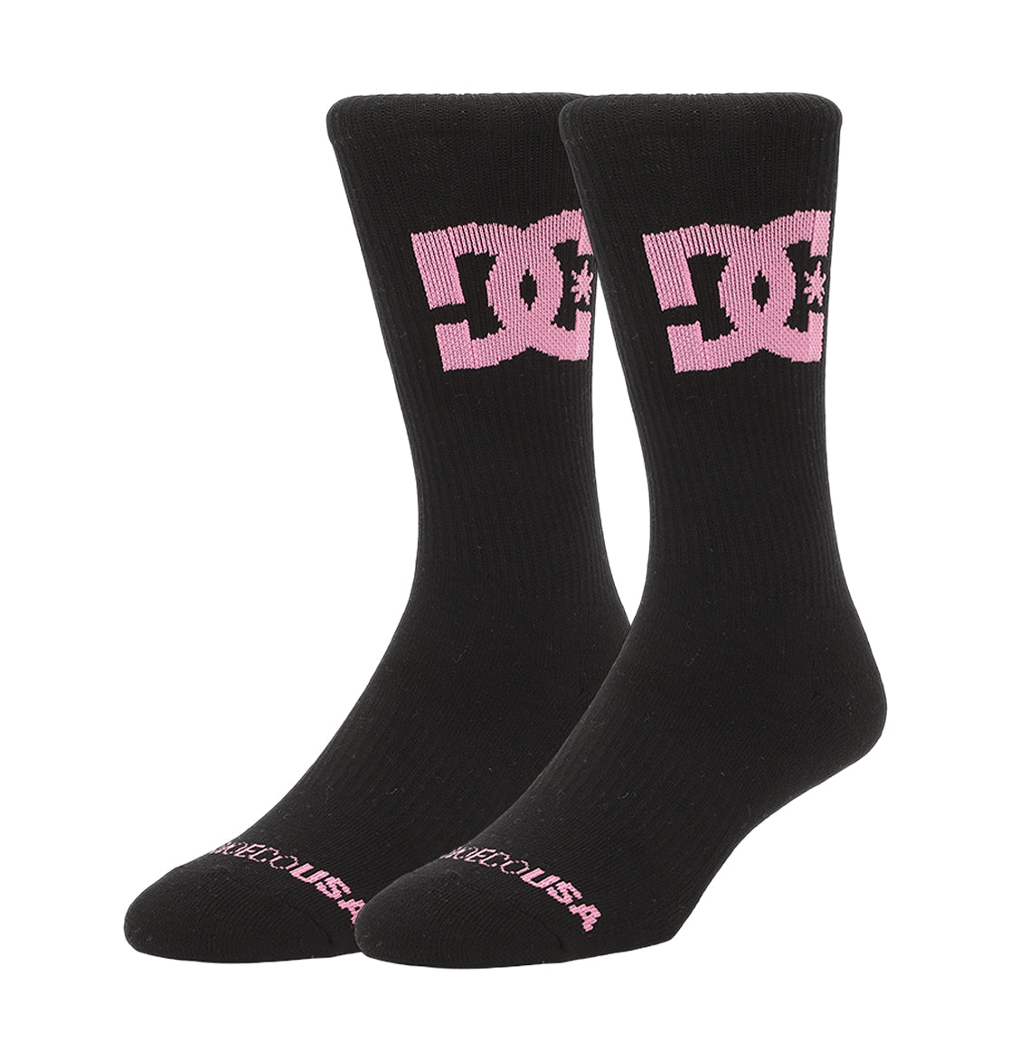 The DC Shoes Big Star Logo Crew Socks 3-Pack includes black crew socks with a large pink DC logo on the sides and "DELICIOUS" in pink near the toes.
