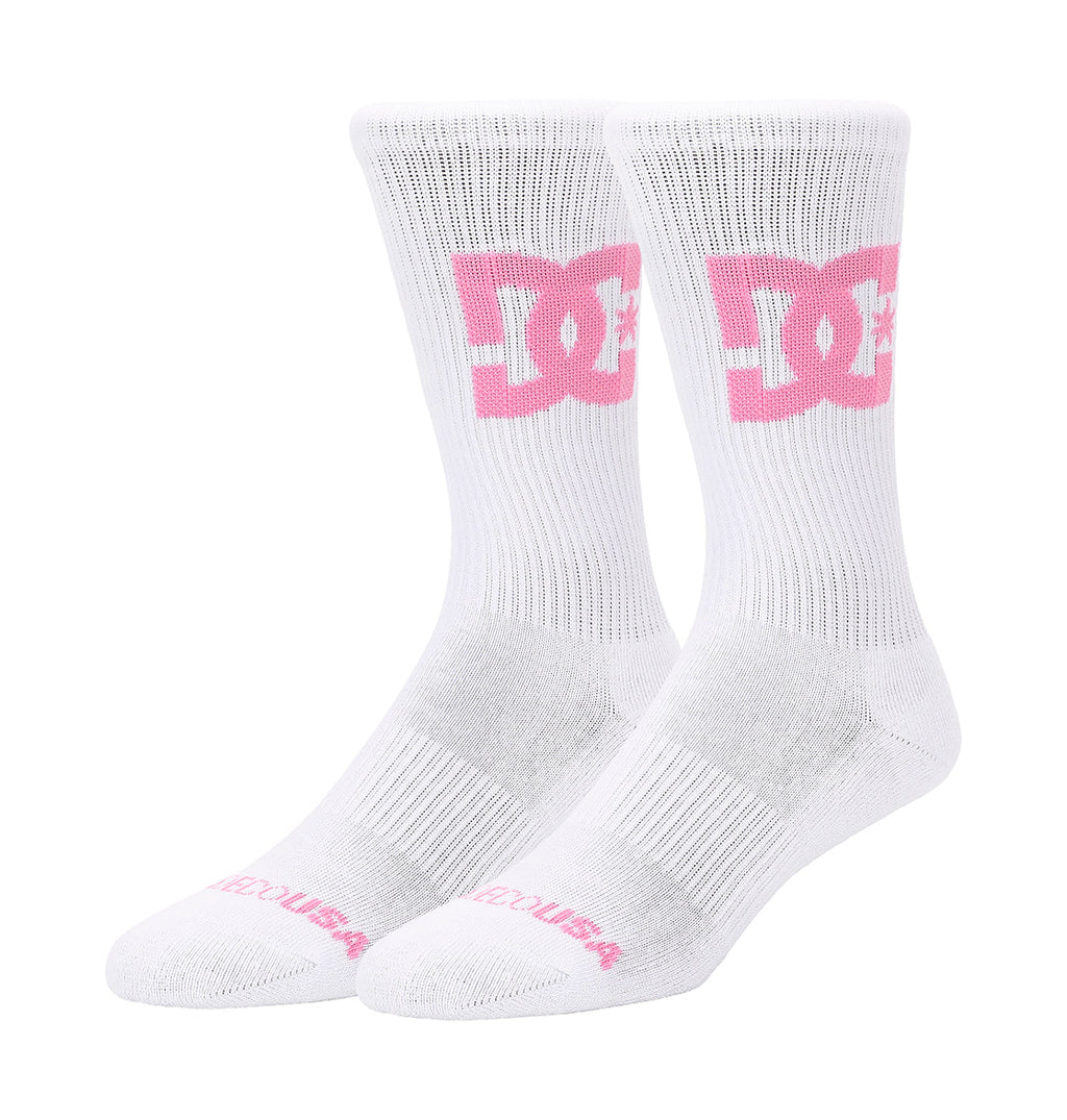 The Big Star Logo Crew Socks 3-Pack by DC Shoes features white crew socks with a large pink DC Shoes logo on the sides, "DC SHOES" text in pink near the toes, ribbed cuffs, and reinforced heels and toes.