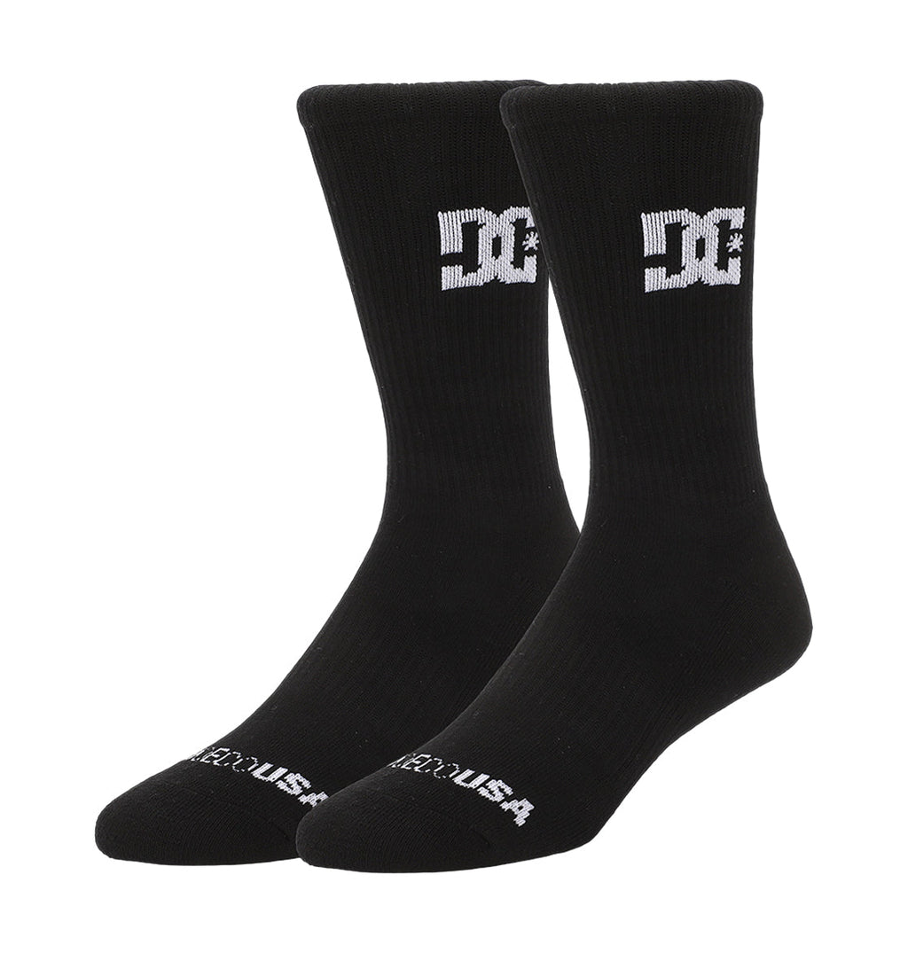A 6-pack of black DC Shoes crew socks featuring white “DC” logos on the sides and “DC SHOES USA” text on the toes, shown against a plain white background.