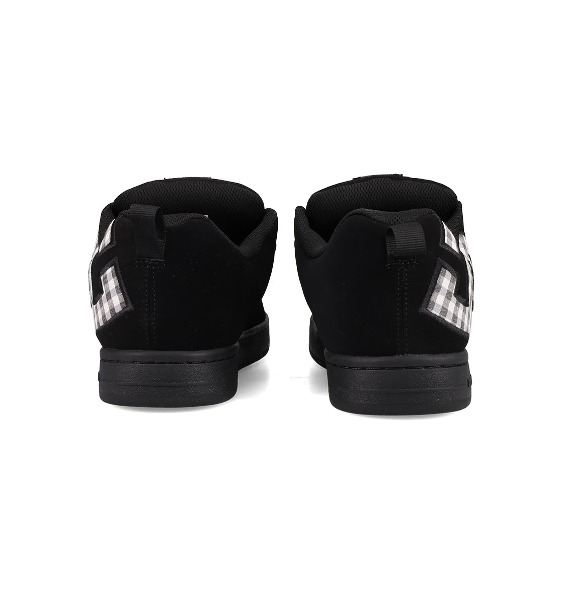 A pair of Men's Court Graffik Shoes by DC Shoes, featuring a classic puffy silhouette and black-and-white checkered side details, shown from the back on a white background.