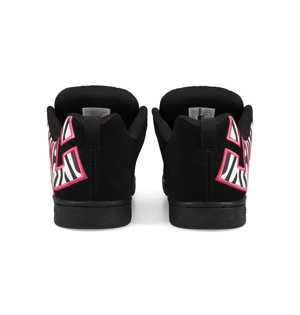 The Women's Court Graffik Shoes by DC Shoes feature a puffy black silhouette with bold white, pink, and red geometric heel patterns, padded collars, black midsoles, and the signature DC logo detail.