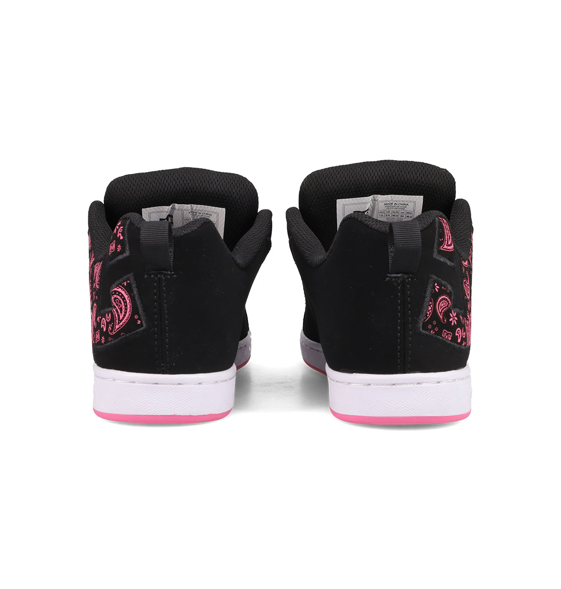 Women's Court Graffik Shoes by DC Shoes in black, featuring pink and white accents. The classic puffy silhouette has a pink paisley heel pattern and a white sole with a pink stripe near the bottom, shown from the back.