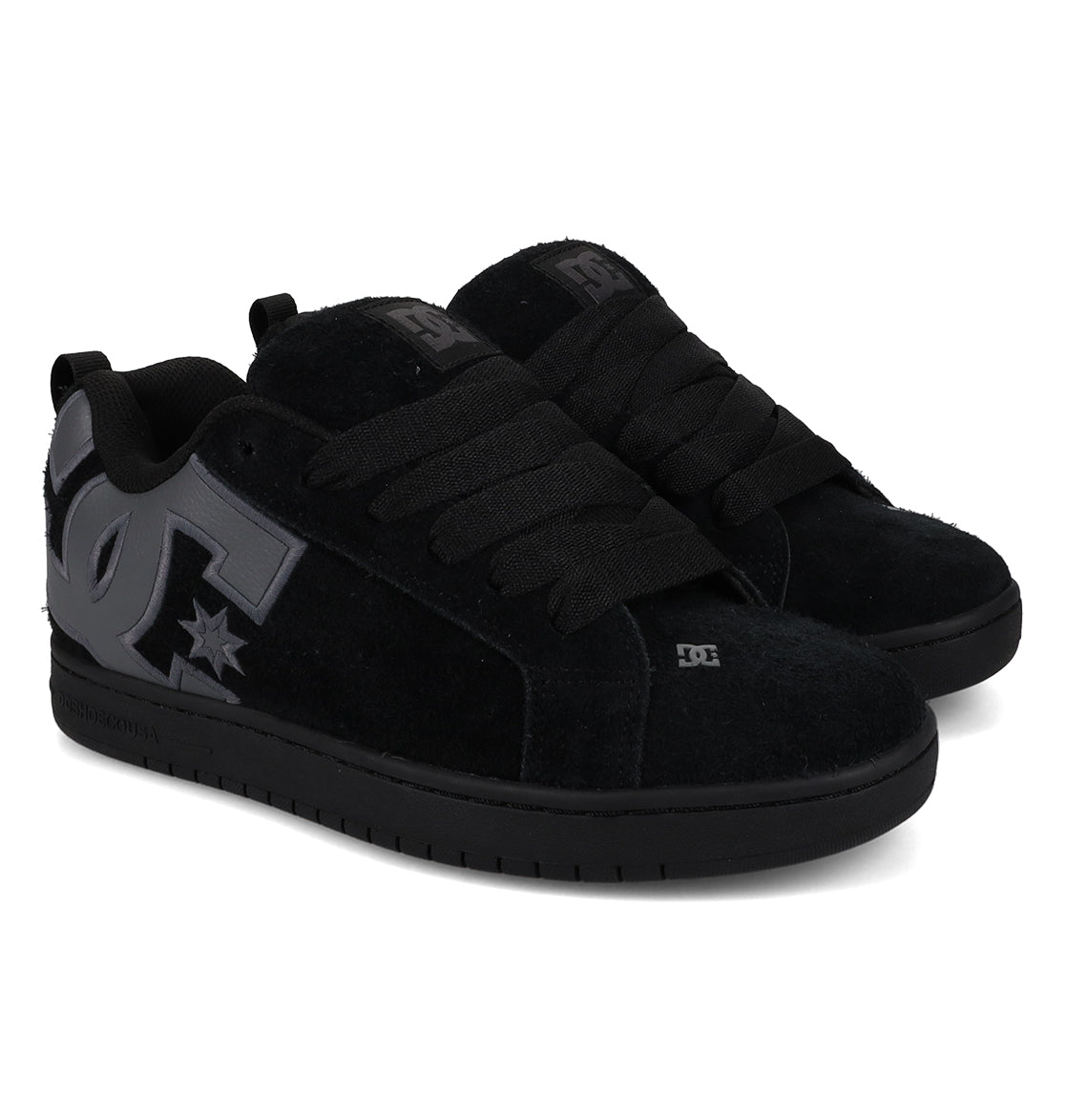 A pair of DC Shoes Men’s Court Graffik Special Edition skate shoes in black, featuring a puffy silhouette, thick black laces, and a large gray DC logo on the side, shown at a slight angle to highlight the outer and front sections of both men’s shoes with a stylish two-tone sole.