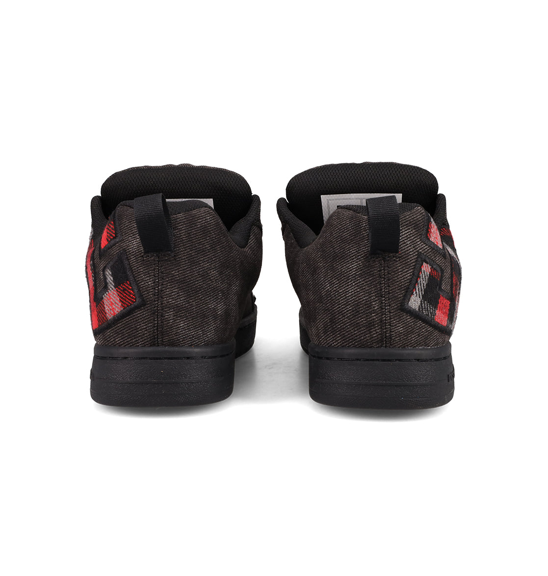The DC Shoes Men's Court Graffik SE features black low-tops with red and gray checkered heel accents, black soles, and premium upper materials for a stylish and durable finish.