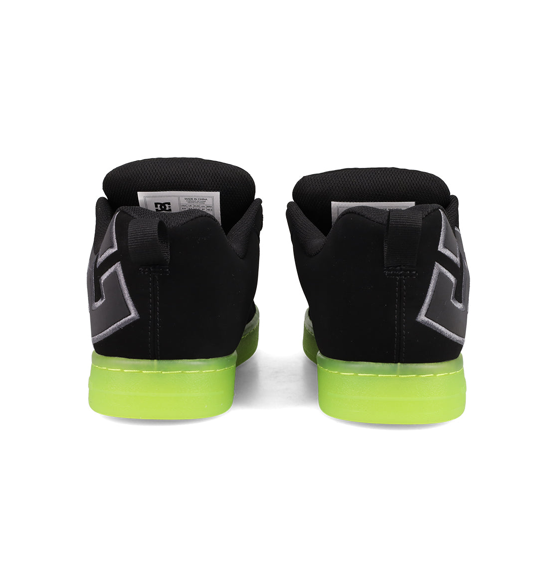 The DC Shoes Men's Court Graffik SE Shoes feature a puffy silhouette, black uppers, bright green soles, and a white and gray geometric heel design. Seen from the back, they include on-trend colorways and black pull tabs at the heel.