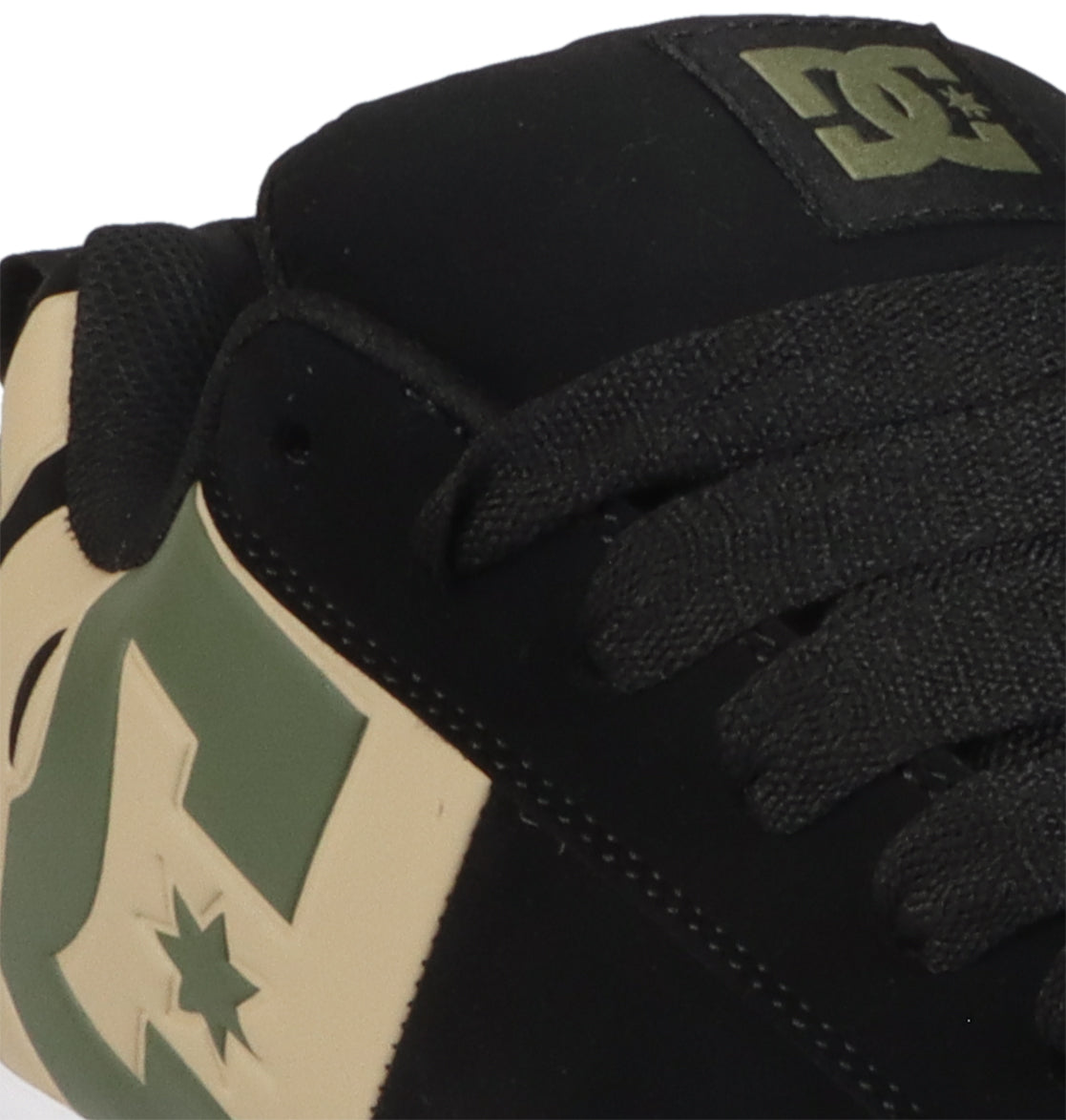 Close-up of the Men’s Court Graffik Special Edition Shoes by DC Shoes, a black sneaker highlighted with green and beige accents. The distinctive DC Shoes logo appears near the laces and on the side, while its classic puffy silhouette cements this model as an iconic pick for fans of skate and street style.