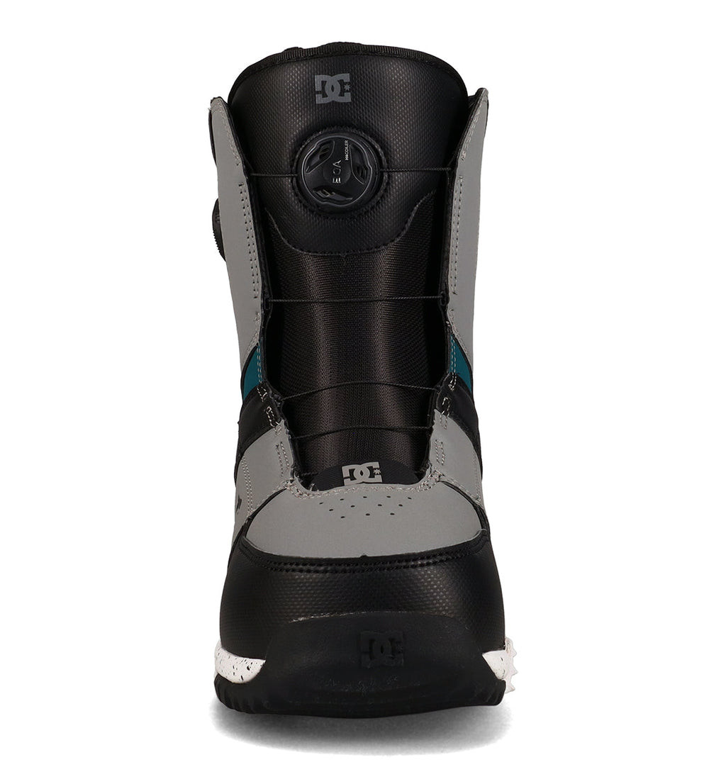 Front view of a single gray and black DC Shoes Men’s Control Snowboard Boot with teal accents and a round tightening dial at the top center—perfect for snowboarding enthusiasts seeking reliable performance.