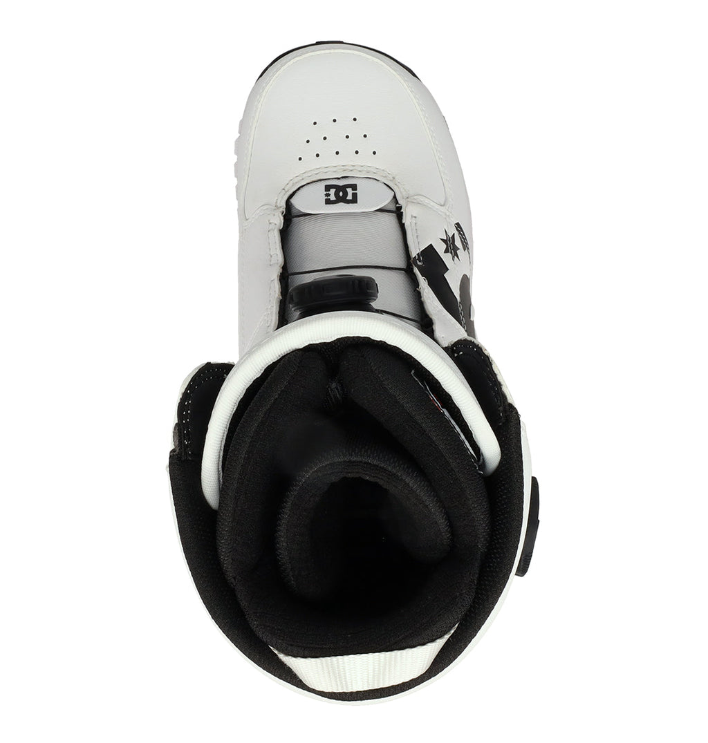 A top view of a white and black men’s snowboard boot from DC Shoes, featuring the DC logo, black laces, and a padded interior—demonstrating the quality design of the Men’s Control Snowboard Boots.