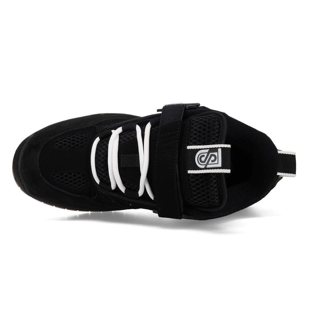 Black athletic shoe with white laces on a white background