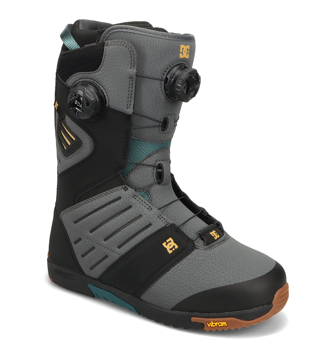 DC Shoes Men’s Judge Snowboard Boots in gray and black feature a dual BOA dial closure system, gold DC logo accents, a teal tongue, and a Vibram gum rubber outsole.
