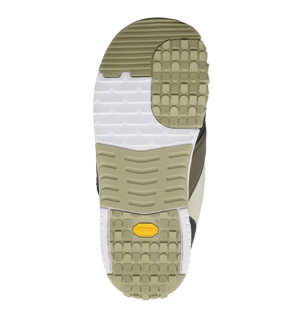 A detailed shot of the sole on the DC Shoes Men’s Judge Snowboard Boots reveals beige, white, and olive green sections with varied tread patterns. Near the heel, a yellow Vibram logo is displayed.