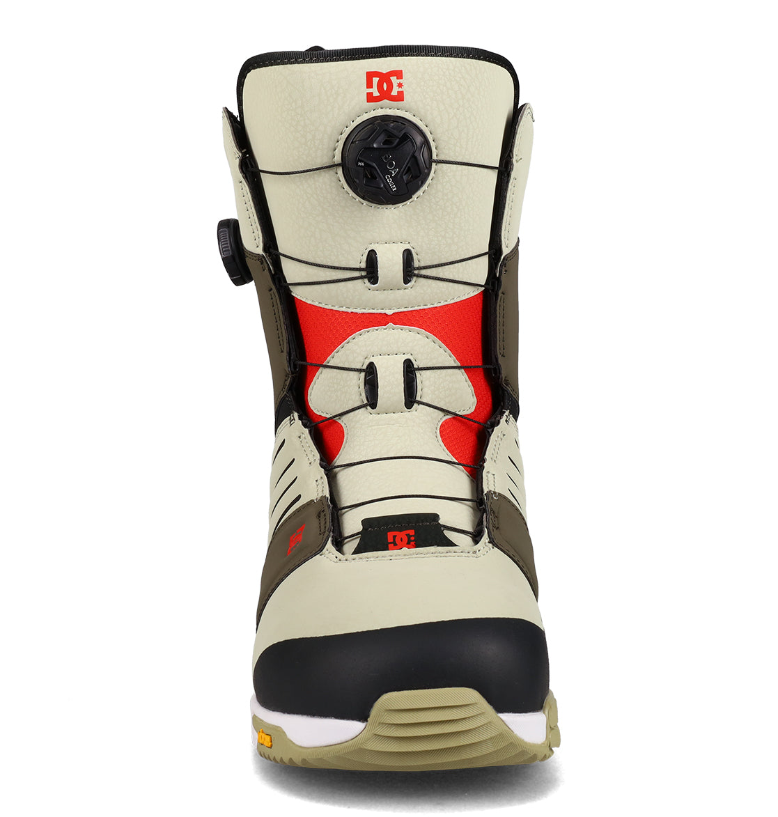 Front view of the DC Shoes Men’s Judge Snowboard Boot in beige and black with red accents, featuring a round black BOA® tightening dial on the tongue and DC logos near the top and toe. The light brown and white sole completes the design.