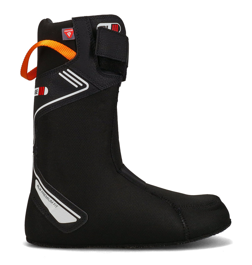 The DC Shoes Men’s Judge Snowboard Boots feature a black removable liner with an orange pull tab, a Velcro strap at the top, and white and red accents, offering durable, advanced support. The boots are shown from the side against a white background.