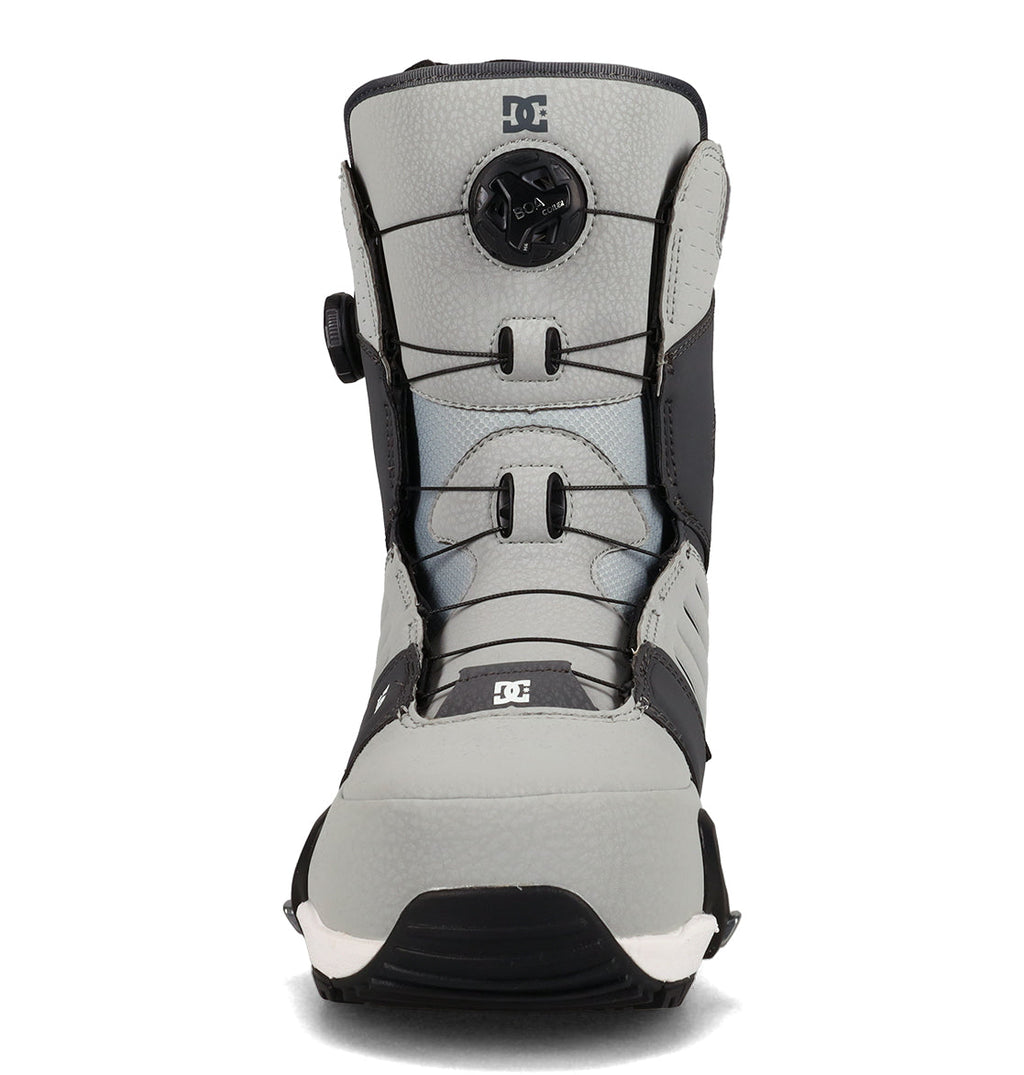 A front view of the DC Shoes Men’s Judge Step On® Snowboard Boots in gray and black, showcasing the central BOA Fit System dial, rugged sole, and distinctive DC logo.