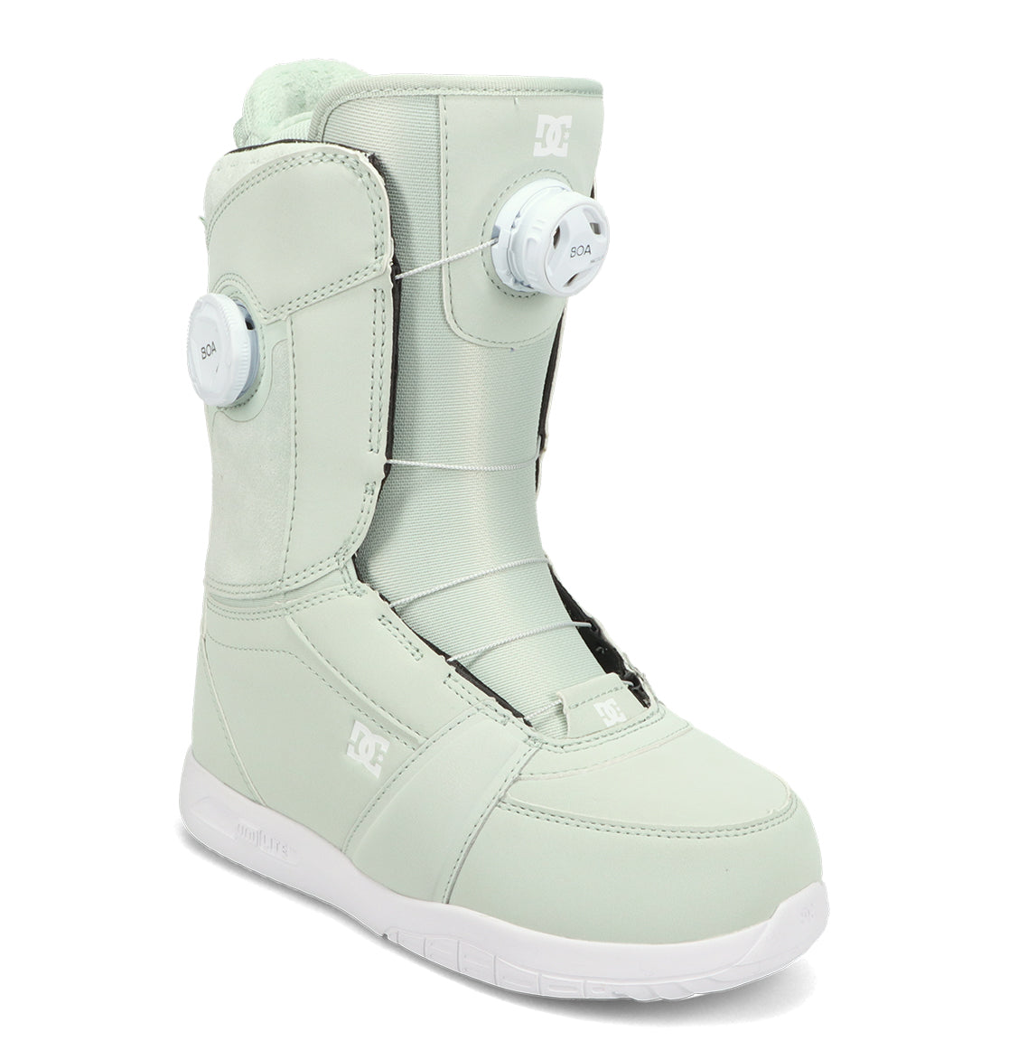 The DC Shoes Women’s Lotus Snowboard Boots in light mint green feature dual BOA dials for customizable tightening, exceptional comfort and support, a white sole, and a prominent DC logo on the side. The boots are displayed at an angle against a white background.