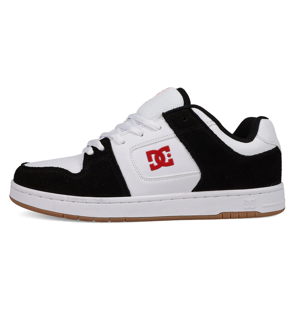 A black and white DC Shoes Men's Manteca 4 skate shoe with a red DC logo, white laces, a white midsole, and a gum-colored outsole for classic style.