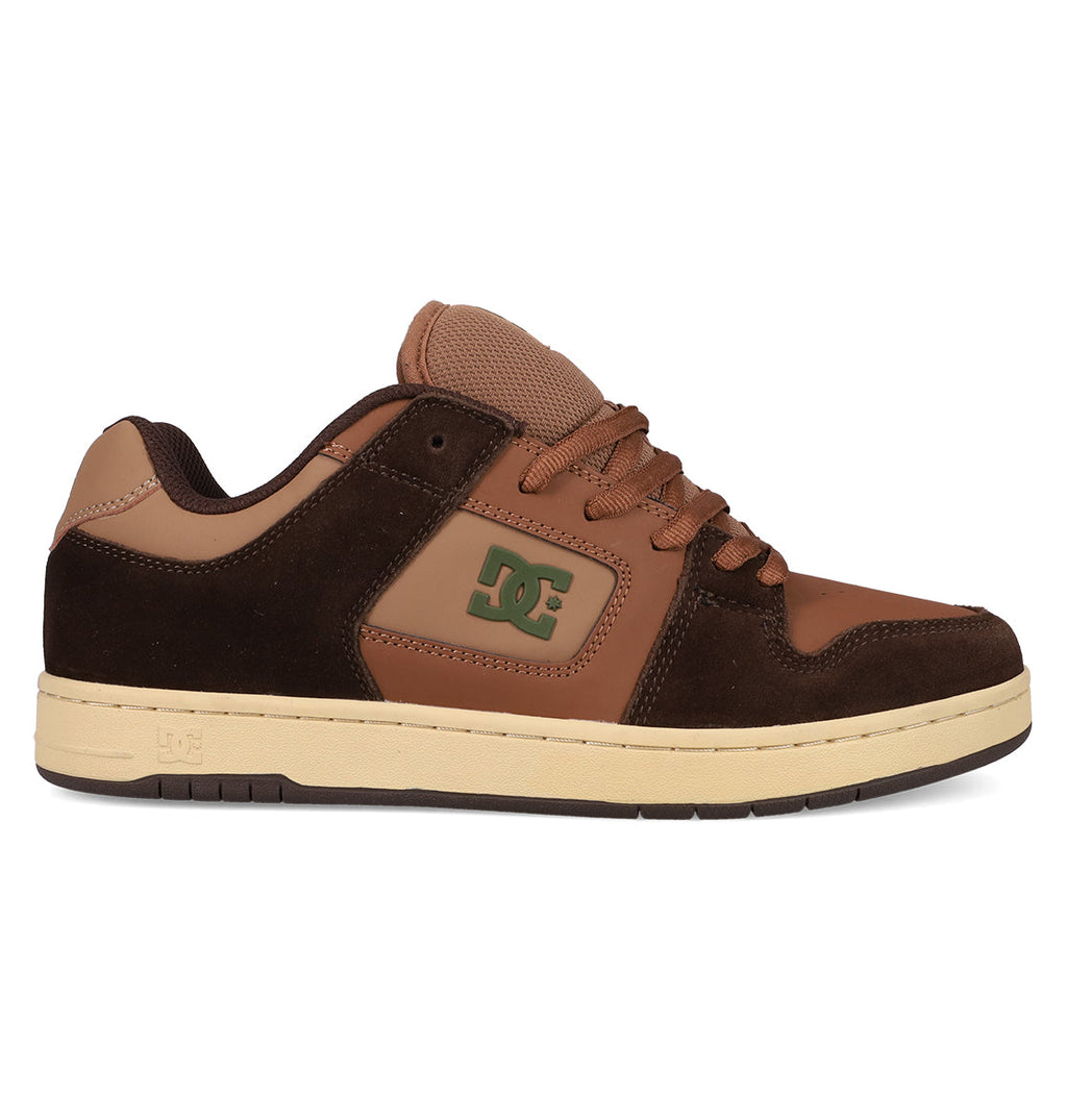 A men's Manteca 4 DC Shoe in brown and tan with a green DC logo, suede and leather panels, brown laces, and a beige rubber sole—ideal for classic skate shoe enthusiasts.