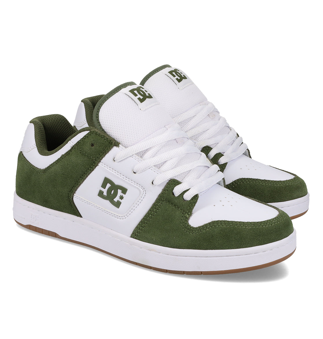 A pair of DC Shoes Men’s Manteca 4 Shoes crafted with white leather and green suede panels, finished with white laces and a gum rubber sole. These shoes offer a performance-focused design, with the DC logo displayed on both the side and tongue.