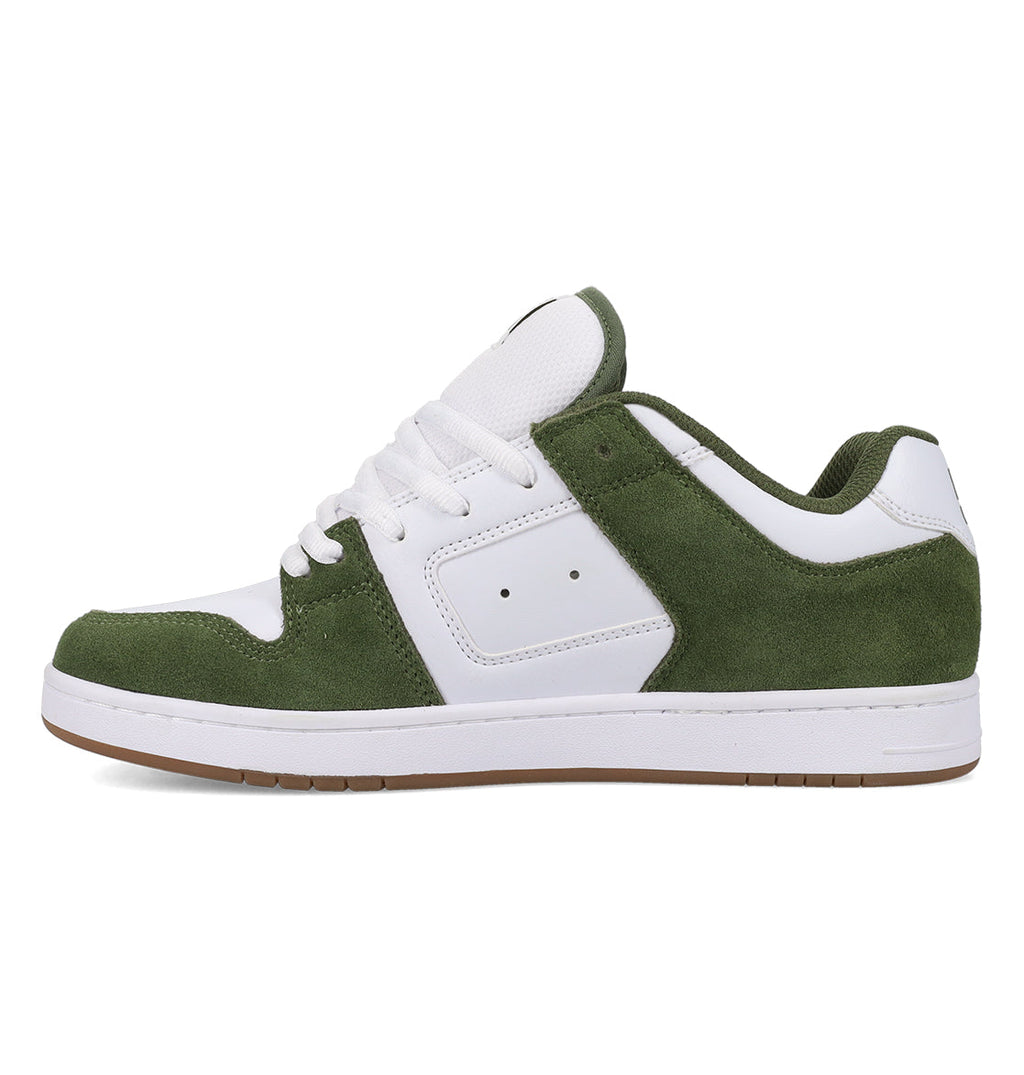The Men’s Manteca 4 Shoes by DC Shoes are white sneakers featuring green suede accents, white laces, and a white sole with a brown bottom. Viewed from the side on a plain white background, this style takes inspiration from classic skate shoes and incorporates performance-driven design elements inspired by the original DC Manteca.