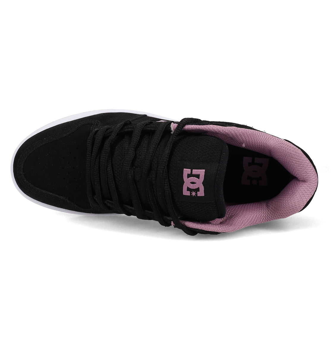 The Women’s Manteca 4 Shoes by DC Shoes feature a classic black design with matching black laces, a crisp white sole, and a light purple inner lining. The iconic DC Shoes logo in white is displayed on both the tongue and the insole.