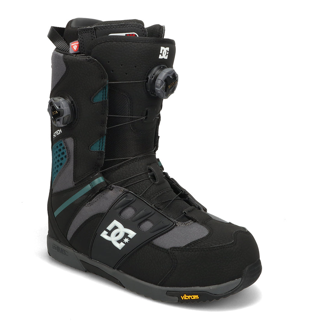 Men’s Phantom Snowboard Boots by DC Shoes in black and gray, featuring dual Boa dials, a Vibram sole, teal accents, and mesh design details. Shown angled slightly to the right on a white background, these performance snowboard boots are built for any winter adventure.