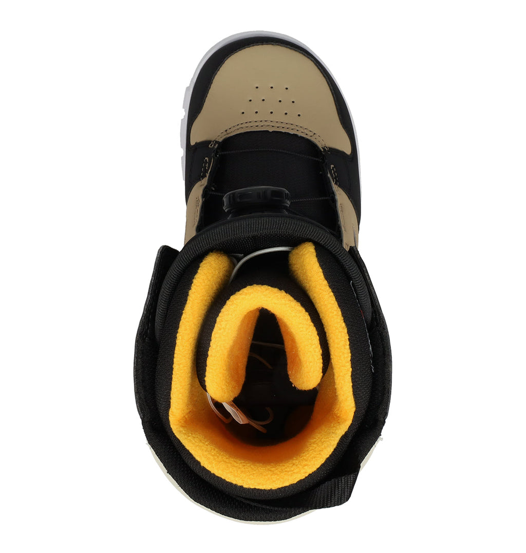 A top view of the DC Shoes Men’s Phase Boa Snowboard Boot in brown and black, featuring a yellow fleece lining, with the rolled collar and tongue visible inside for added comfort and performance.