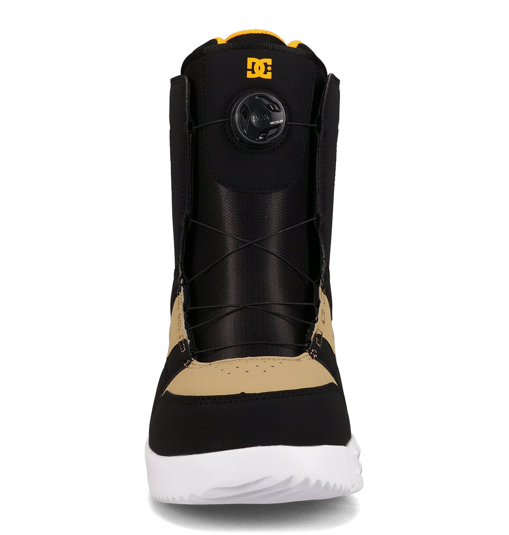 Front view of the DC Shoes Men’s Phase Boa Snowboard Boots in black and tan with a white sole, featuring black laces and a round yellow DC logo on the Boa adjustment dial near the top—perfect for riders seeking high-performance snowboard boots.