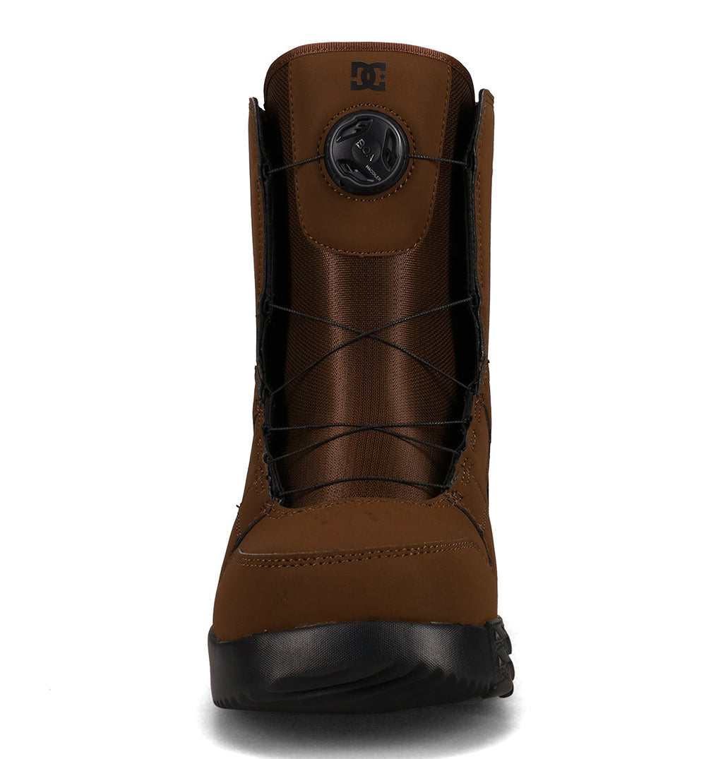 Men’s Phase Boa Snowboard Boots by DC Shoes in brown with a black sole, displayed in a front-facing view. These snowboard boots feature the convenient Boa system with a round tightening dial for quick and easy adjustments, along with crisscrossed black laces. The signature DC Shoes logo appears at the top front of the boot, offering all-day comfort both on and off the slopes.