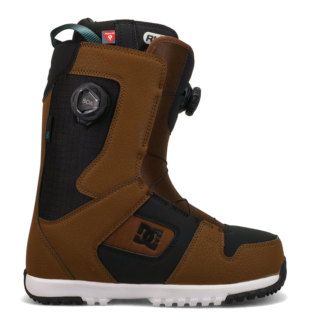 Introducing the DC Shoes Men’s Phase Boa Pro Snowboard Boots, shown here in a brown and black colorway with a white sole. These boots feature the advanced BOA dial lacing system for a secure fit, along with the signature DC logo on the side—perfect for riders seeking reliable snowboard boots equipped with Boa Pro technology.