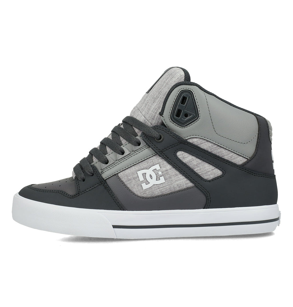 The Men’s Pure High Shoes by DC Shoes feature a gray and black high-top design with a white sole, gray laces, and the iconic DC logo on the side panel. Offering comfort, style, and versatility, these sneakers are the perfect choice for any casual outfit.
