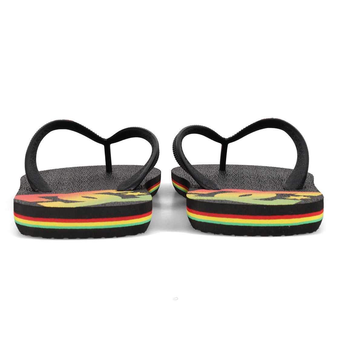 A pair of DC Shoes Men’s Spray Slides viewed from the back, featuring black straps and soles accented with red, yellow, and green stripes—these must-have slides are perfect to slip on after a long skate session.