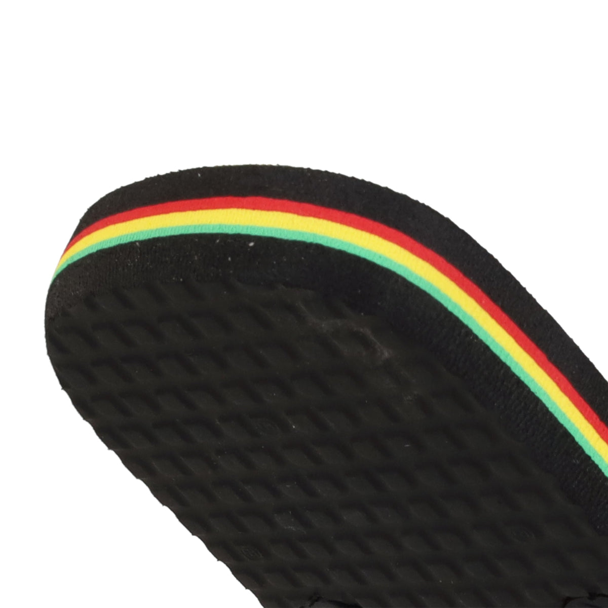 Close-up of the DC Shoes Men’s Spray Slides in black, featuring a slip-on design with red, yellow, and green stripes running along the side. The visible sandal pattern on the sole highlights their comfort, making these slides a must-have for relaxing after a skate session.