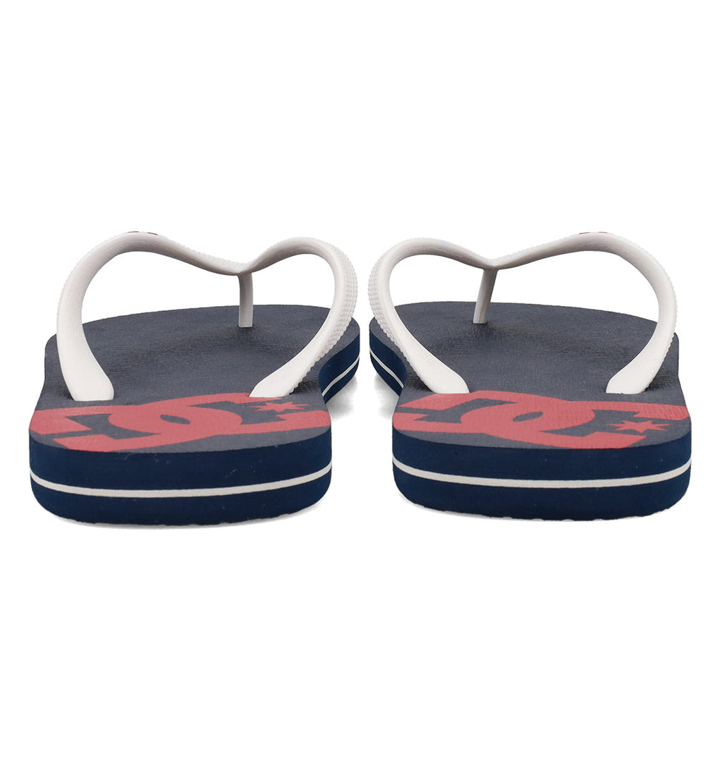 A pair of navy blue DC Shoes Men's Spray Slides with white straps, seen from the back. The footbeds have a large red logo, partly visible—must-have slides for everyday comfort.