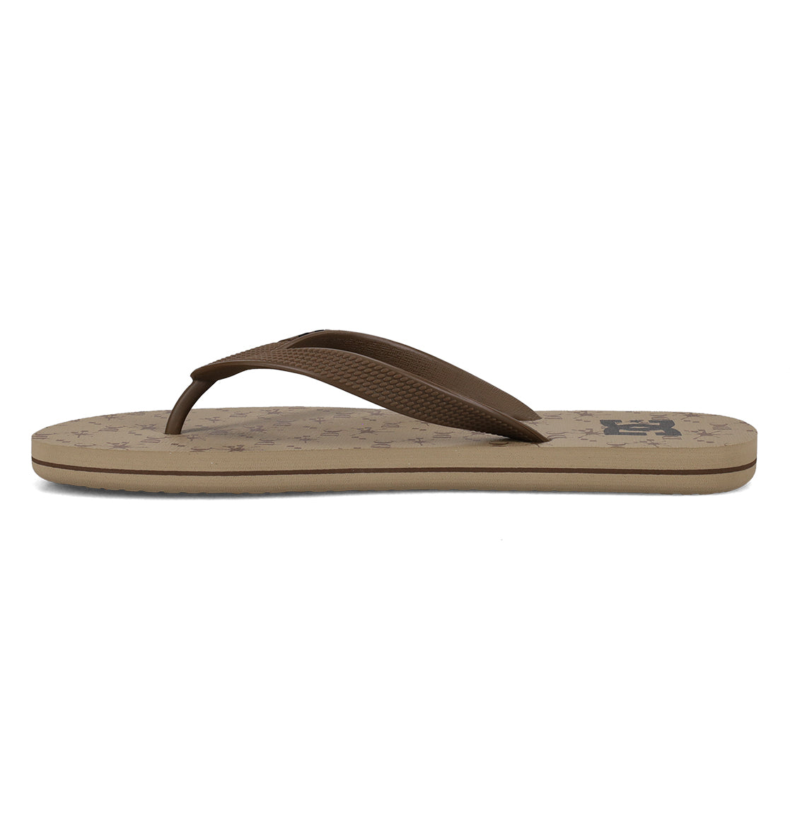 The DC Shoes Men's Spray Graffik Slides feature a brown textured strap and beige sole, shown in side profile on a white background—a must-have for any casual skate session.