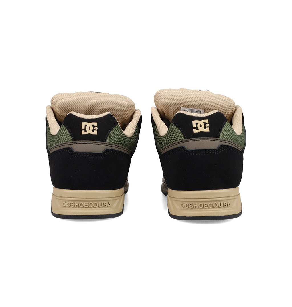 The DC Shoes Men's Stag Shoes are shown from the back in black, olive green, and tan, featuring cupsole construction with the DC Shoes logo and DCSHOECOUSA text on the heel and sole.