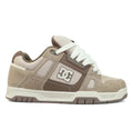 The Men’s Stag Shoes by DC Shoes showcase a beige and brown color scheme with white laces and the signature DC logo on the side. Crafted from a combination of suede and mesh, these skate shoes feature an oversized puff tongue for enhanced comfort. The durable cupsole outsole comes in light beige with brown accents, making them both stylish and functional for skating.