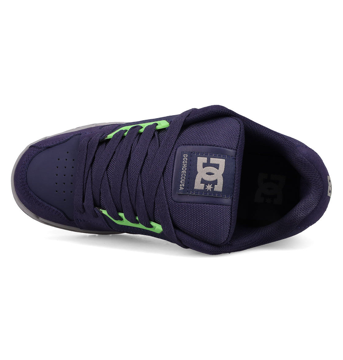 Top view of Men's Stag Shoes by DC Shoes in dark purple with neon green laces, perforated toe, cupsole construction, and a DC Shoes logo patch on the tongue for a bold skate-inspired style.