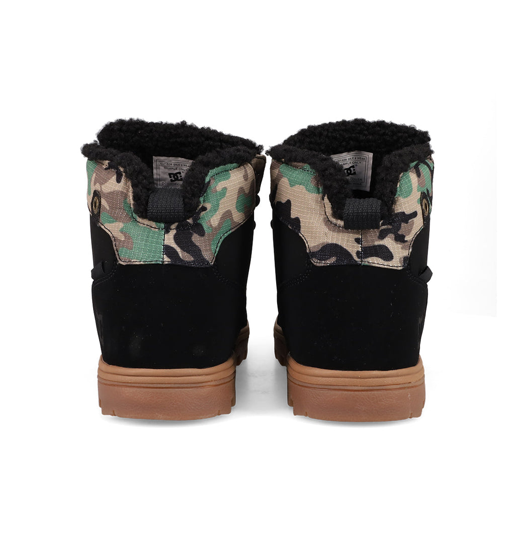 Men’s Woodland Winter Boots by DC Shoes seen from the back, featuring black suede, camouflage ankle fabric, cozy sherpa lining, and brown rubber soles.