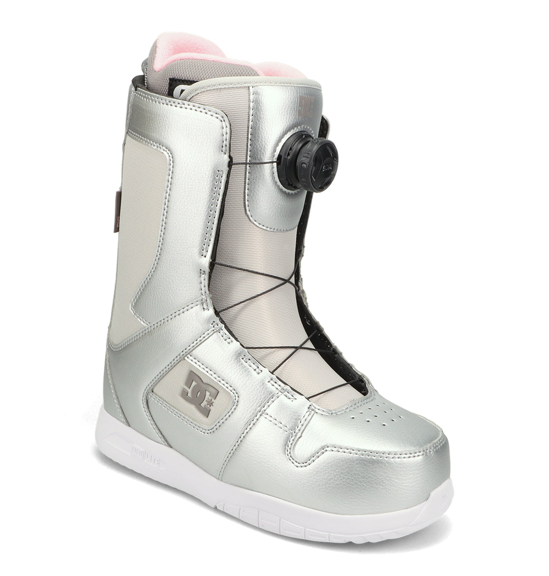 The Women’s Phase BOA® Snowboard Boots by DC Shoes are shown at an angle against a white background, featuring a silver exterior, black laces, the BOA Fit System dial for easy tightening, a white sole, and a light pink inner lining.