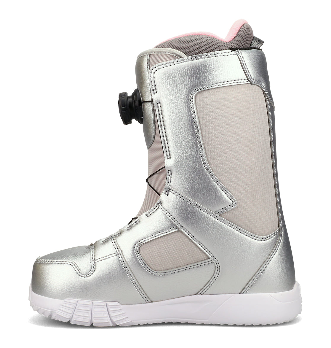 A side view of the DC Shoes Women’s Phase BOA® Snowboard Boot in silver, featuring a white sole, round BOA Fit System adjustment dial on the side, light pink interior lining, reinforced panels, and IMPACT-ALG insoles for enhanced comfort.