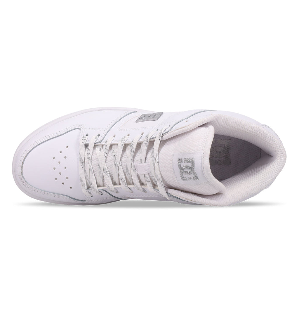 A top view of the DC Shoes Women’s Manteca 4 Hi High-Top shoe in white, featuring gray laces and perforations on the toe box, photographed against a white background to showcase its performance-oriented design.